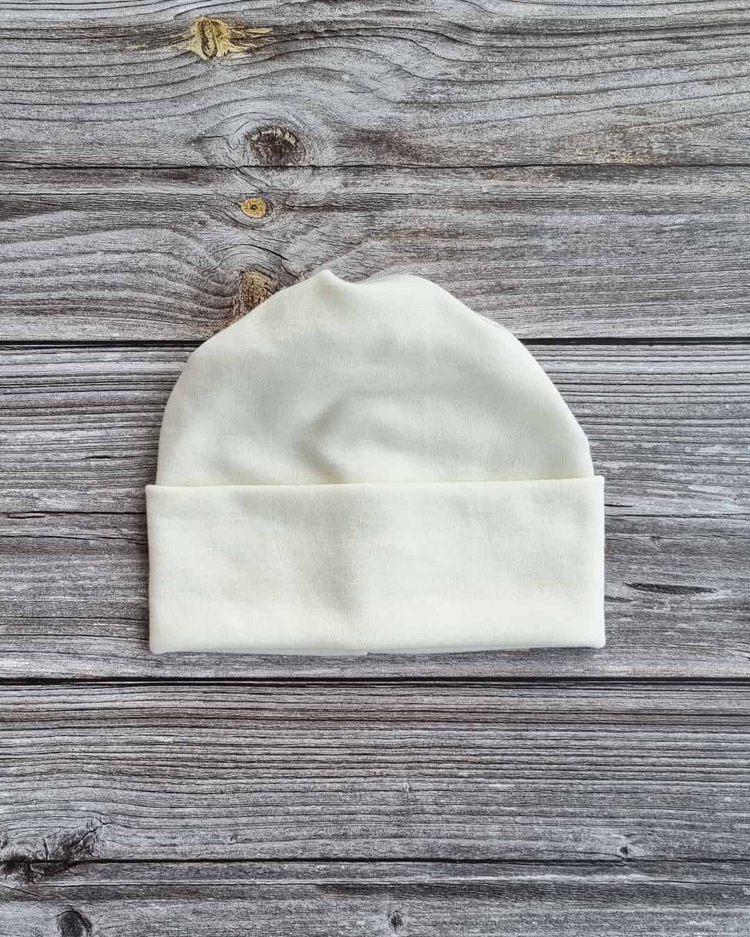 Aikuisten luonnon valkoinen merinovilla ponnaripipo.