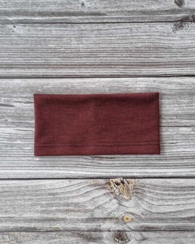 Lasten tumman punainen merinovillapanta.