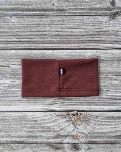 Lasten tumman punainen merinovillapanta.