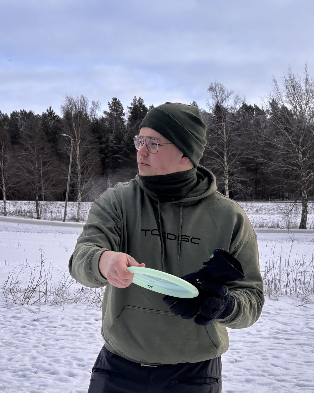 Vihreä merinovilla tuubihuivi.